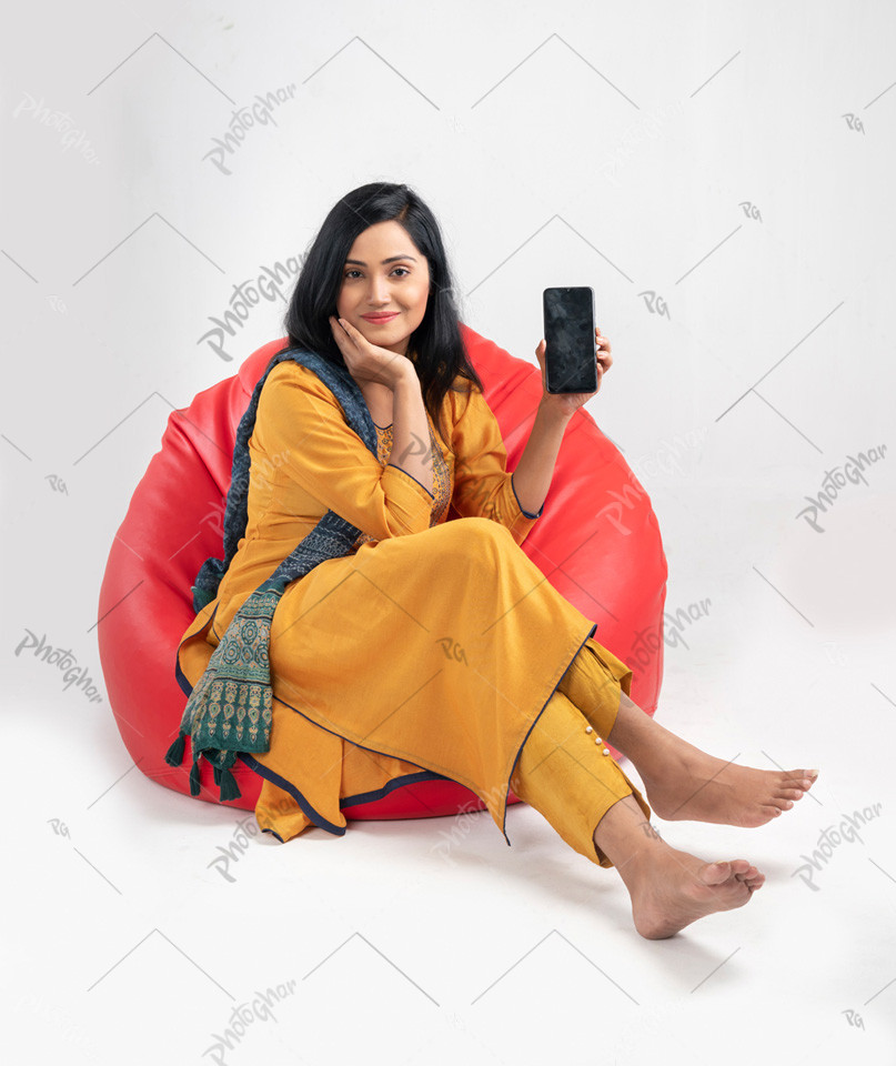 A Beautiful girl sitting on bean bag