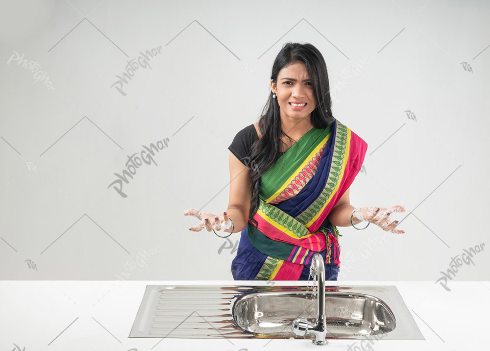 Angry housewife with uncleanness kitchen basin