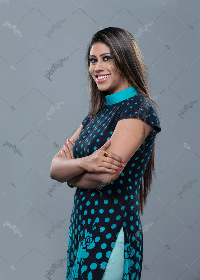 Arms crossed young adult woman