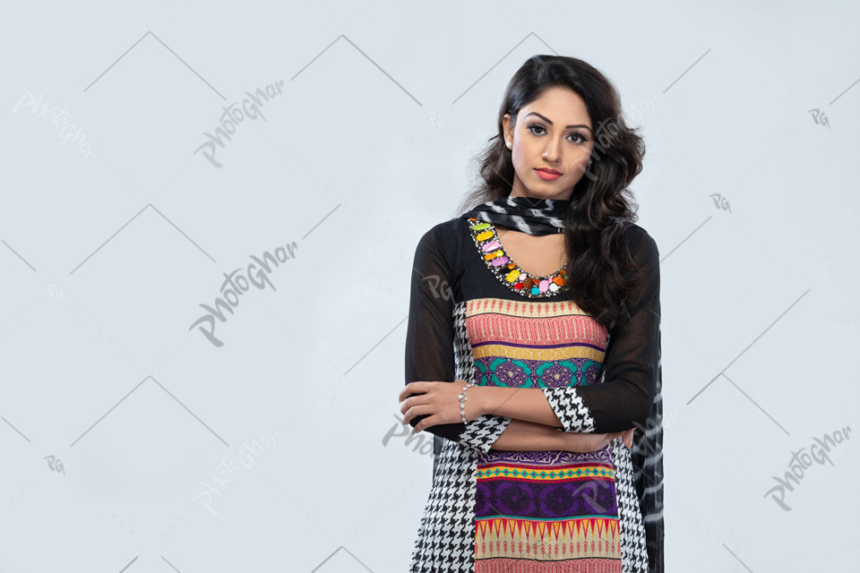 Arms folded woman with wavy hair