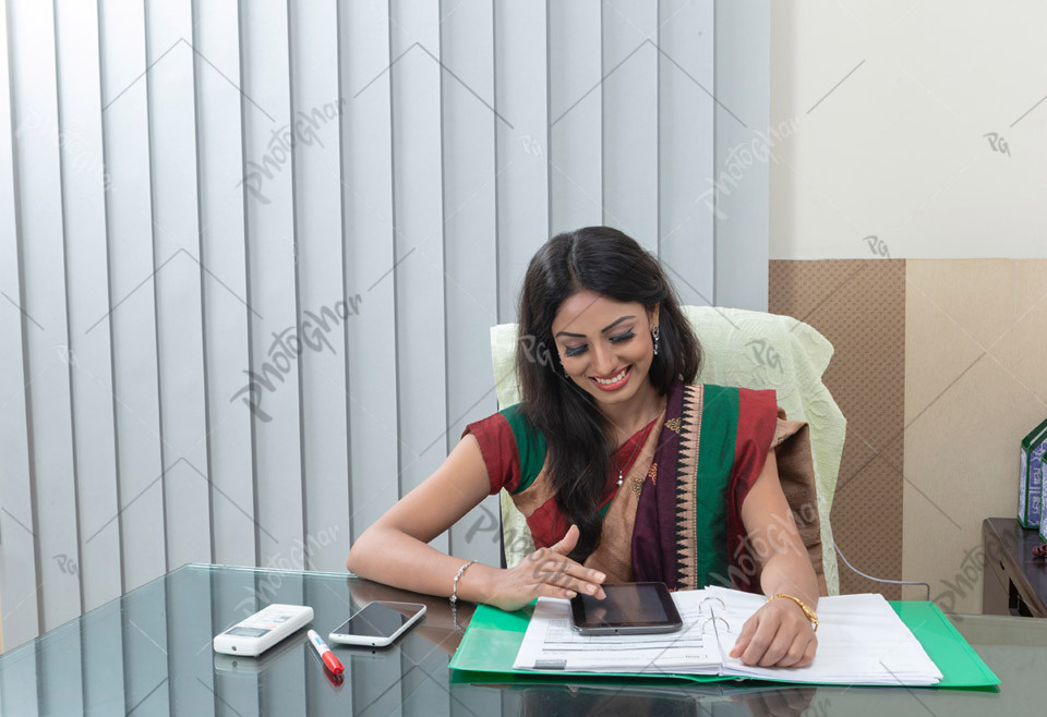 Attractive smiling female business woman