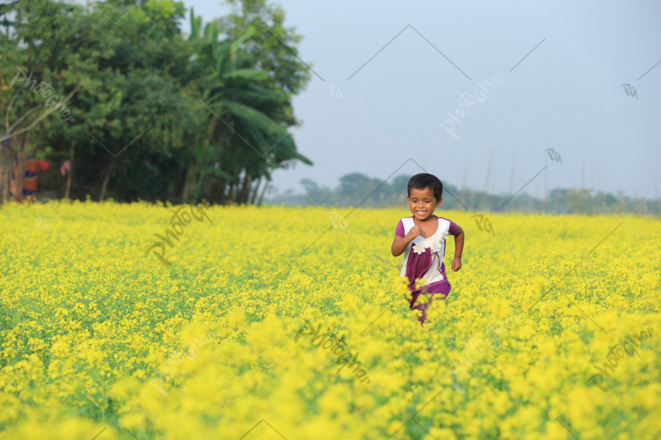 Baby running in field