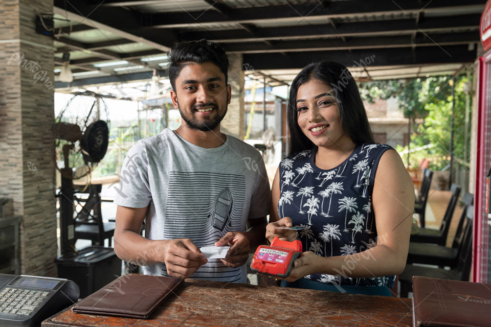 Bangladeshi Couple Using Credit Card for Online Payment