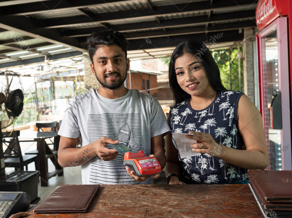 Bangladeshi Couple Using Credit Card for Online Payment