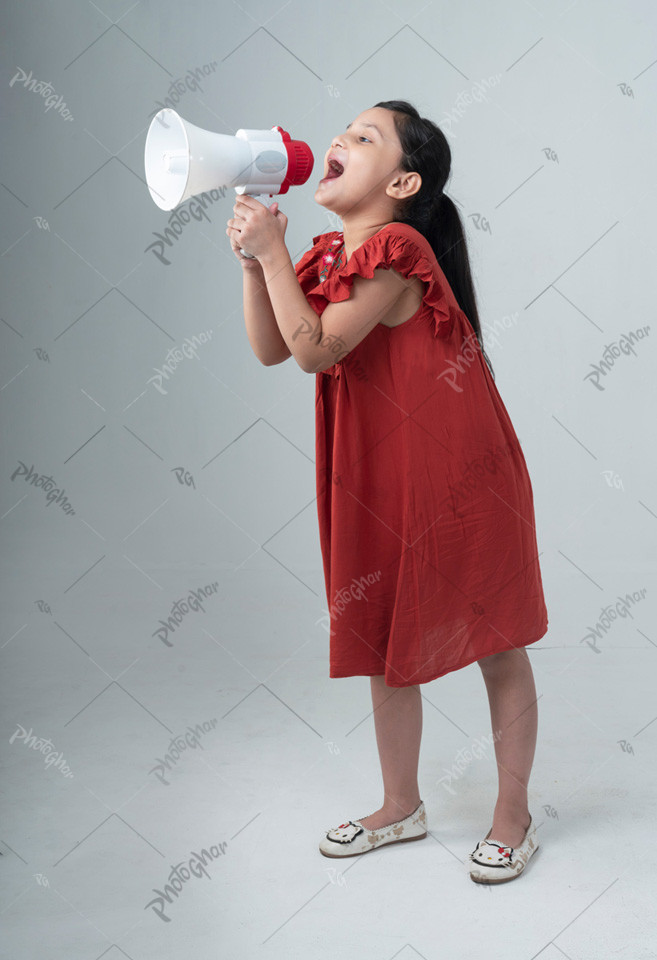 Bangladeshi Kid with megaphone shouting