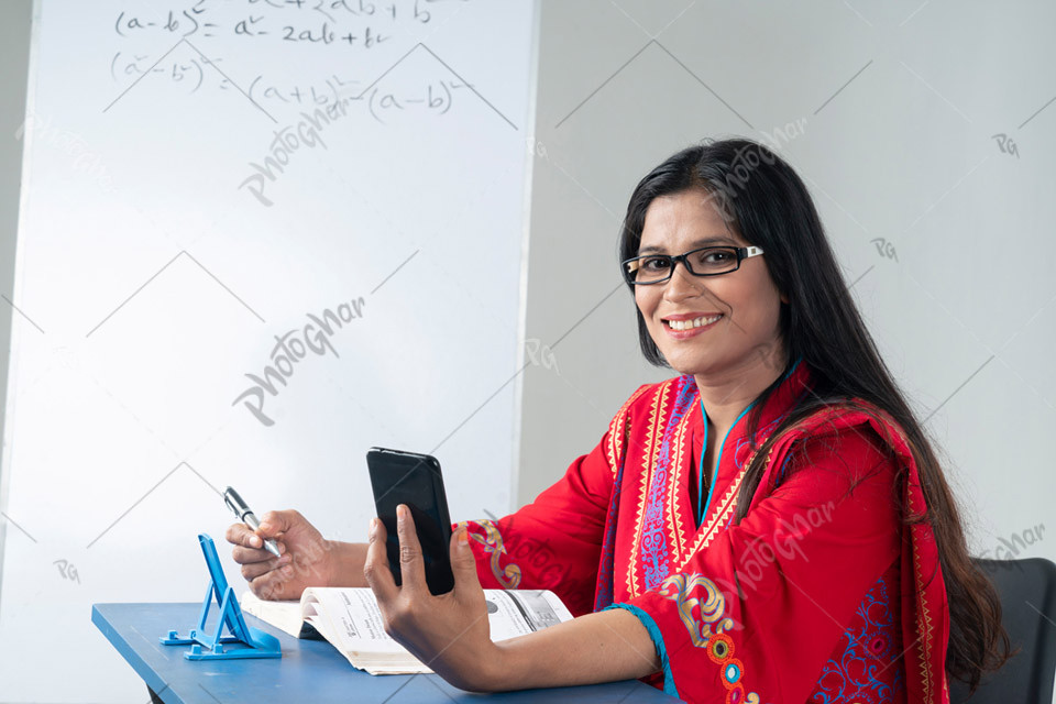 Bangladeshi Woman teacher Teaching Online