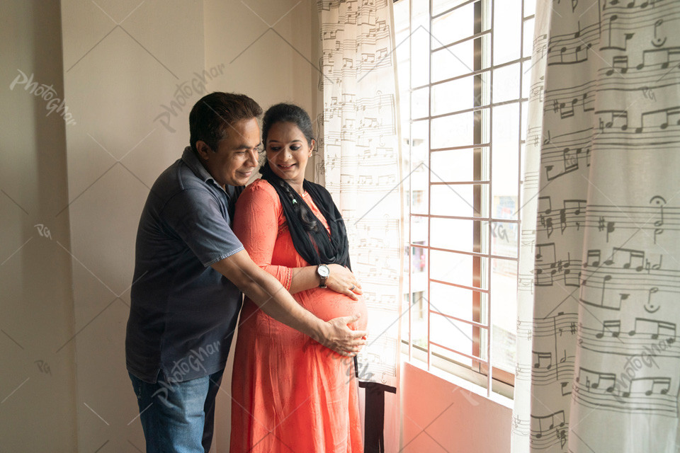 Bangladeshi couple feeling baby movement