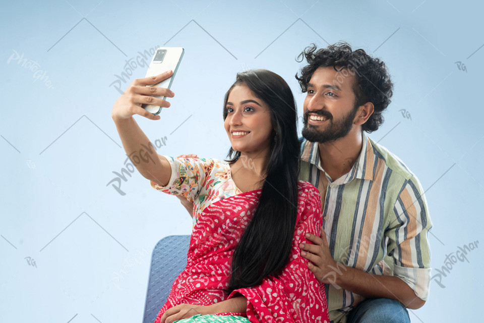 Bangladeshi couple taking selfie