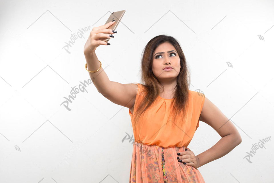 Bangladeshi female taking selfie