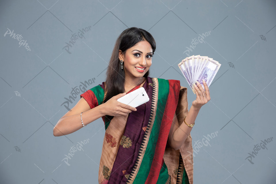 Bangladeshi happy woman cashes out taka