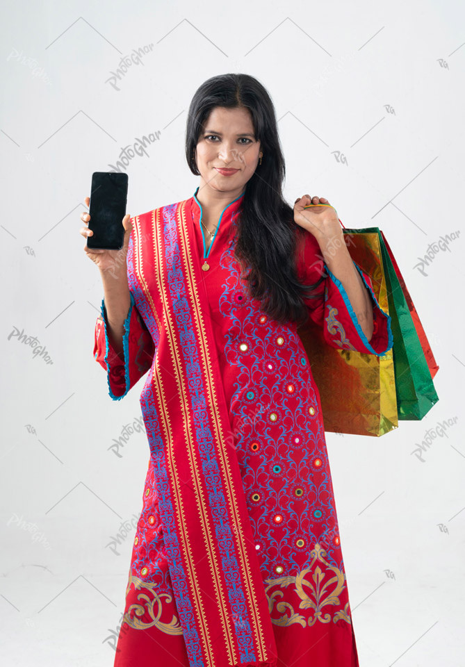 Bangladeshi housewife showing smartphone apps