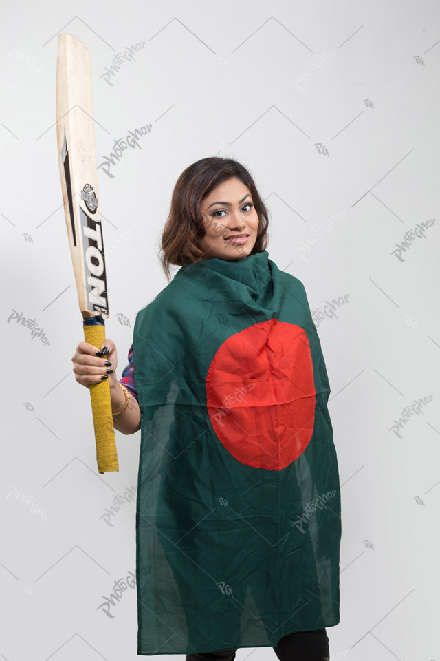 Bangladeshi woman covering national flag