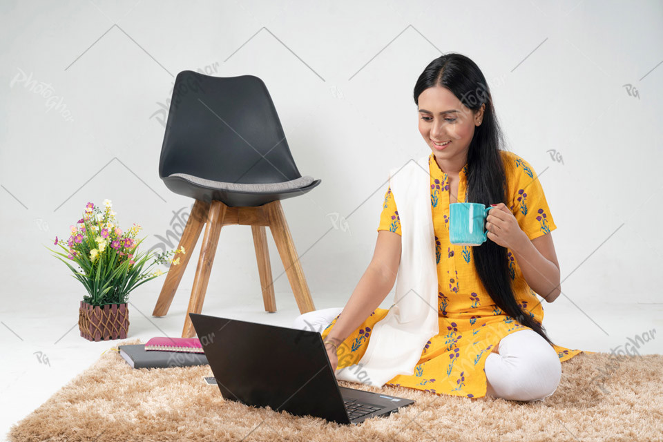 Bangladeshi woman freelancer using laptop