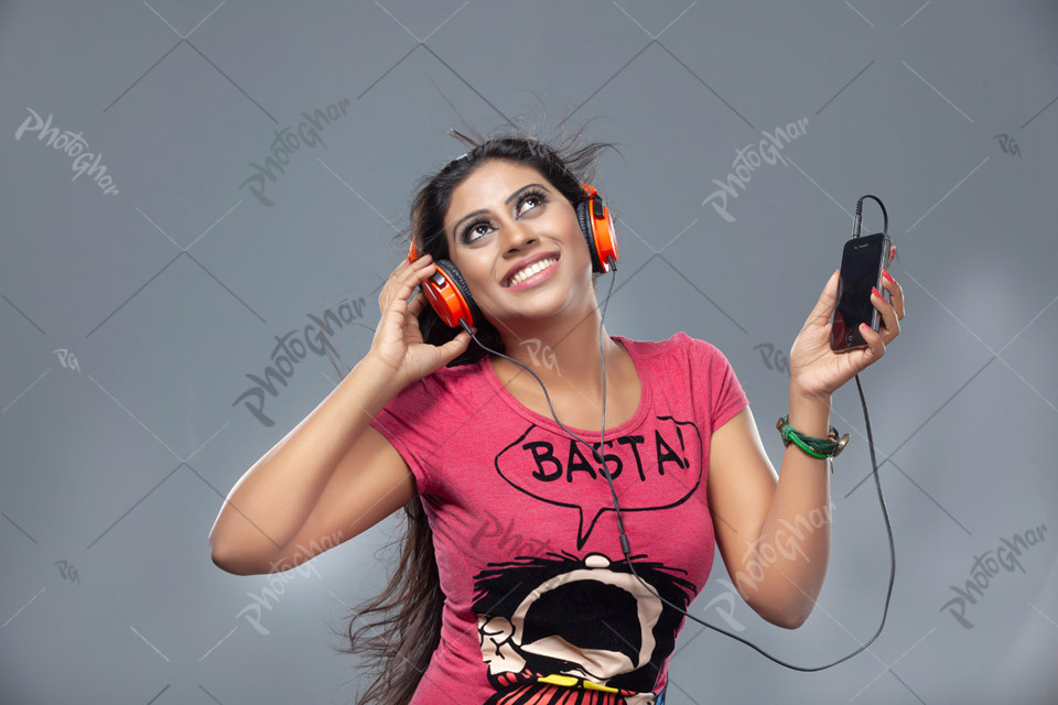 Bangladeshi woman listening to music