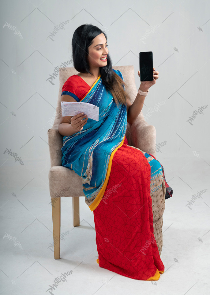 Bangladeshi woman useing smartphone