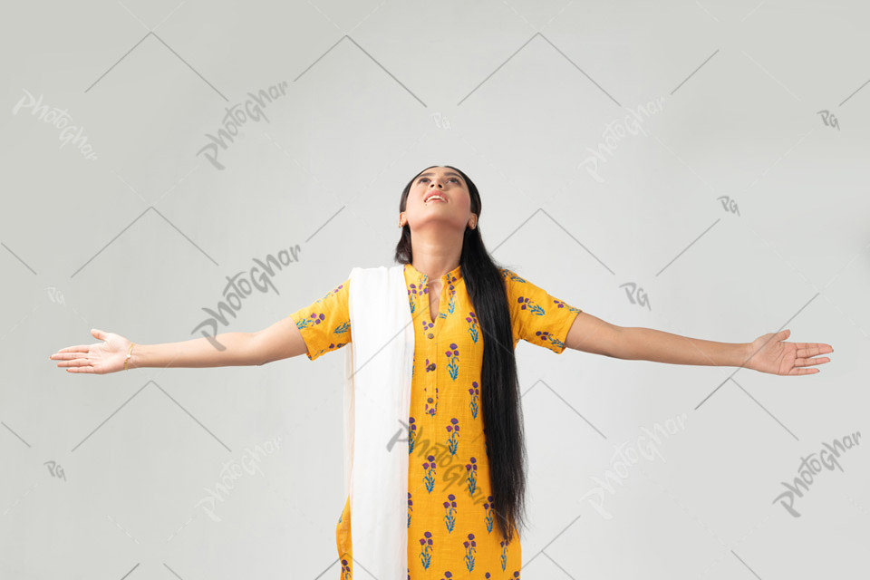 Bangladeshi young girl with arms wide open