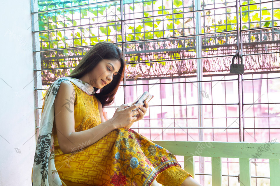 Beautiful lady relaxing and connecting on social networks