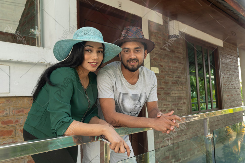 Beautiful tourist couple with cap