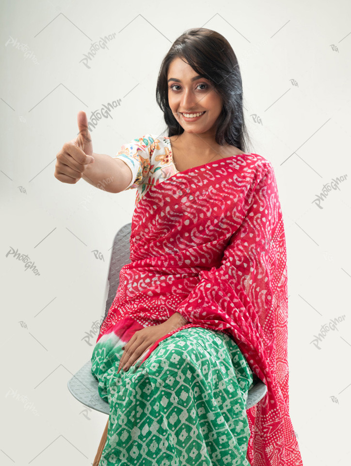 Beautiful woman giving thumbs up