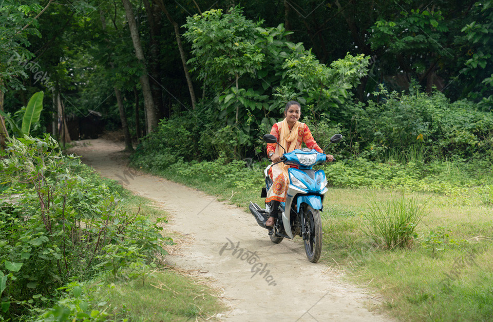 Beautiful young girl of rural village road