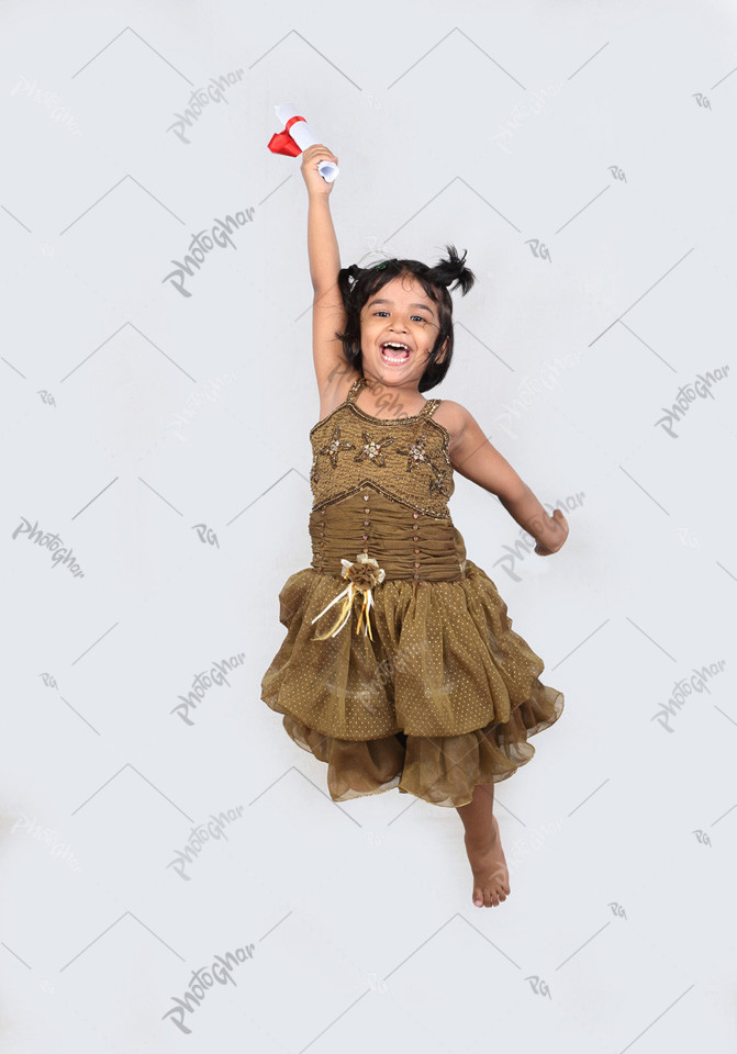 Charming little girl jumping