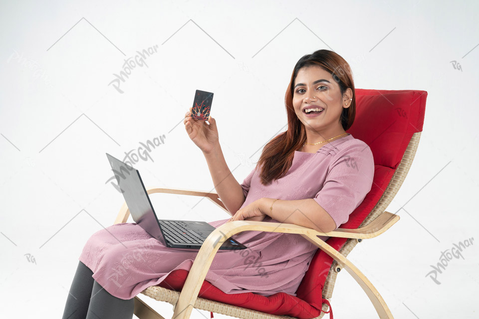 Cheerful female paying utility bill