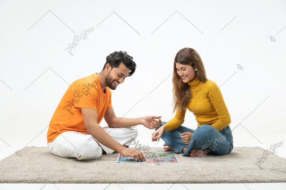 Cheerful girlfriend and boyfriend playing