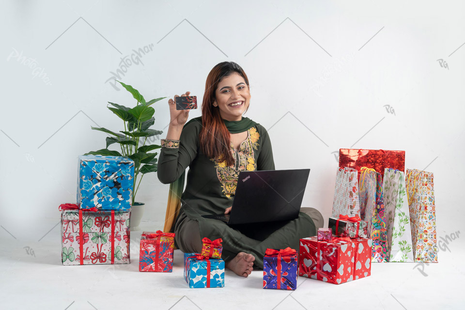 Cheerful smiling housewife using payment gateway