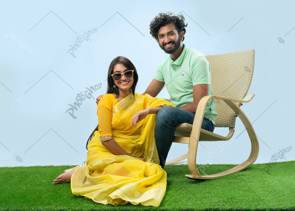 Cheerful stylish couple celebrating falgun