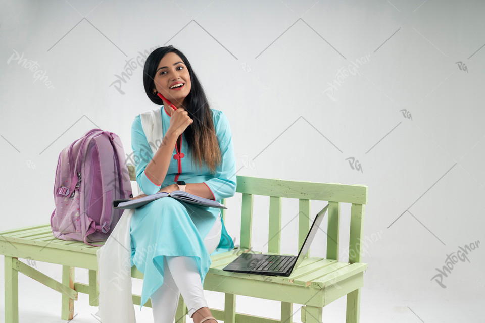 College female student sitting and thinking