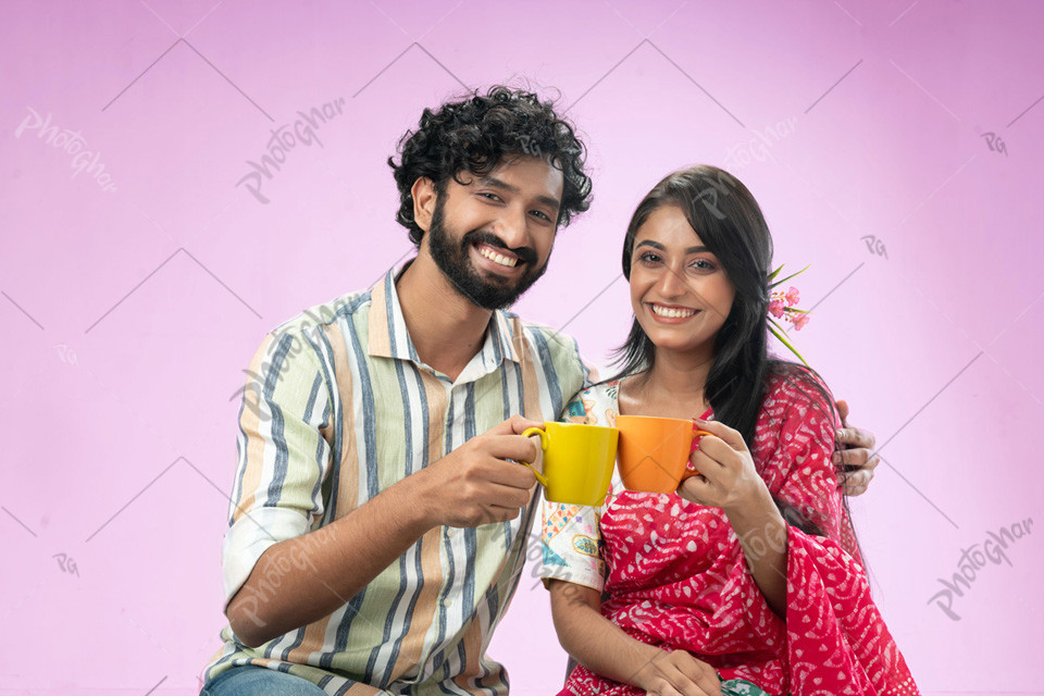 Confident smiling couple having coffee