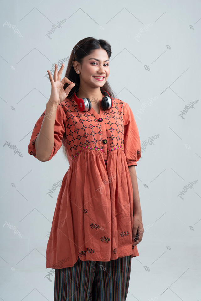 Confident smiling woman pointing tasty sign