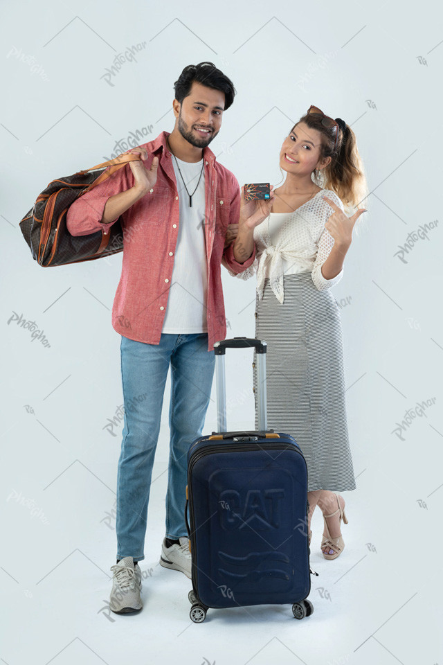 Couple showing bank card for travel offers