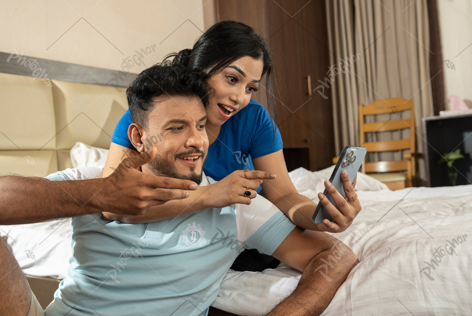 Couple watching discount offers