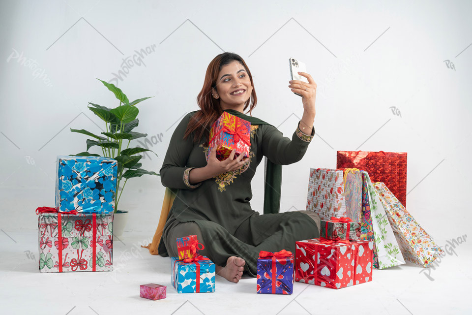 Delighted Young Woman with E-commerce Deals at Home