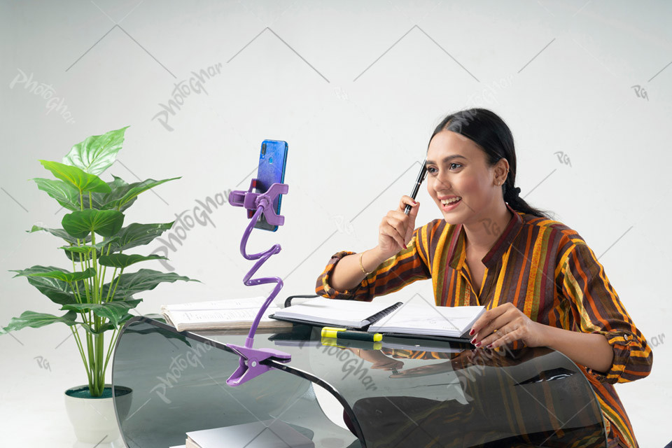 Delighted woman student attending online