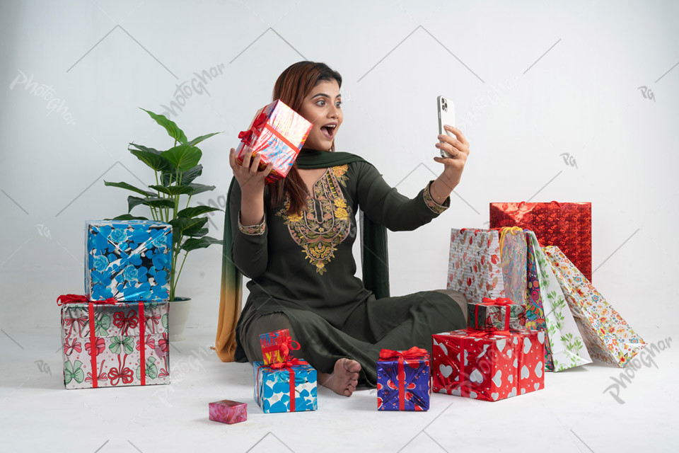 Excited Young Woman with Online Deals at Home