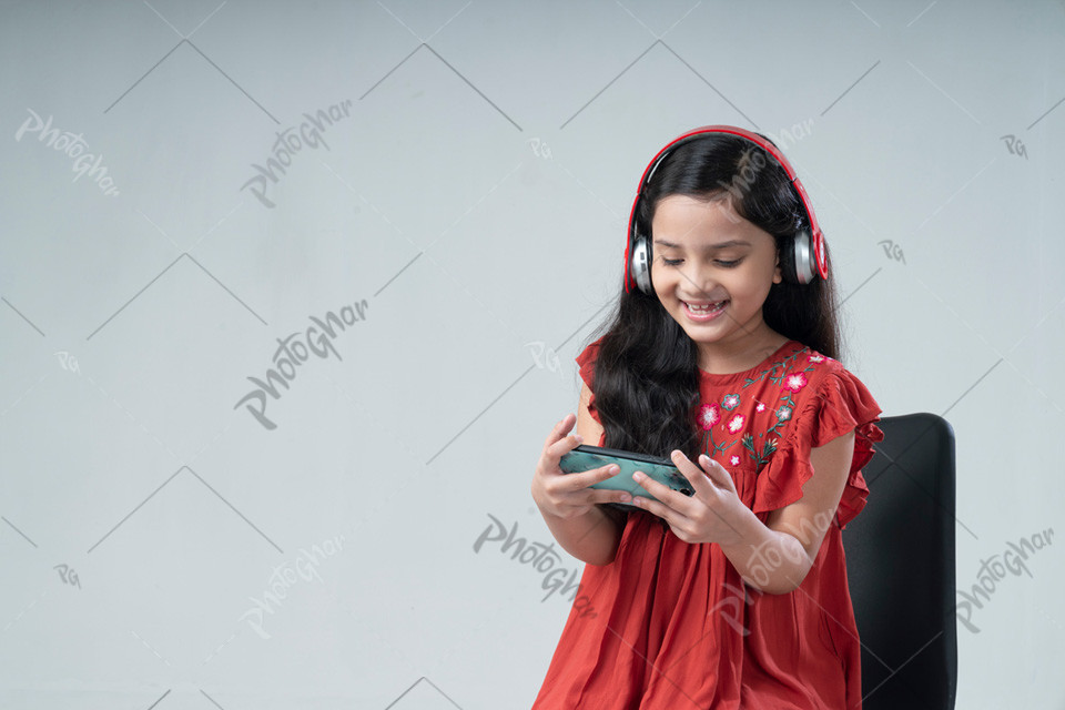 Excited child wearing headphone