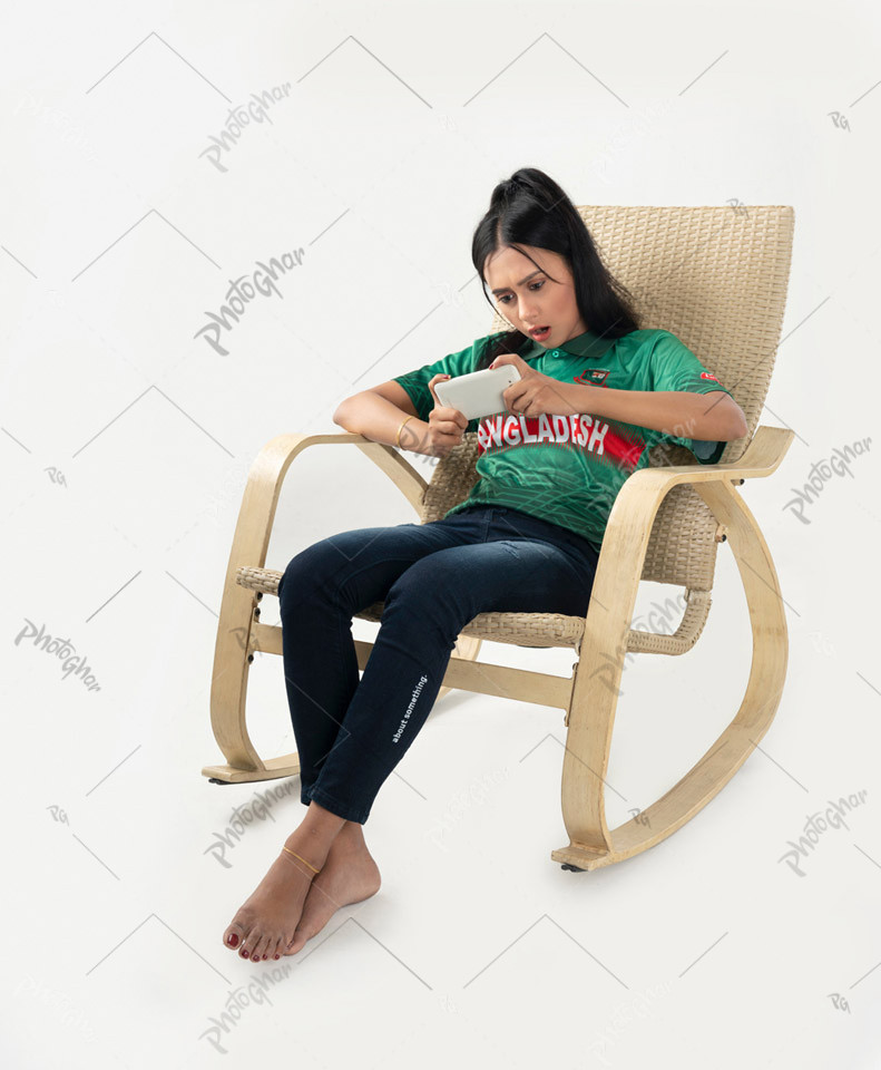 Female cricket fan wearing Bangladeshi jersey