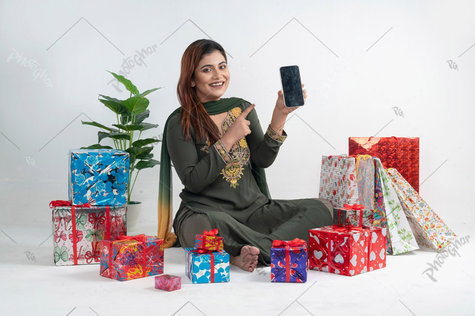 Female shopper pointing at astonishment offers