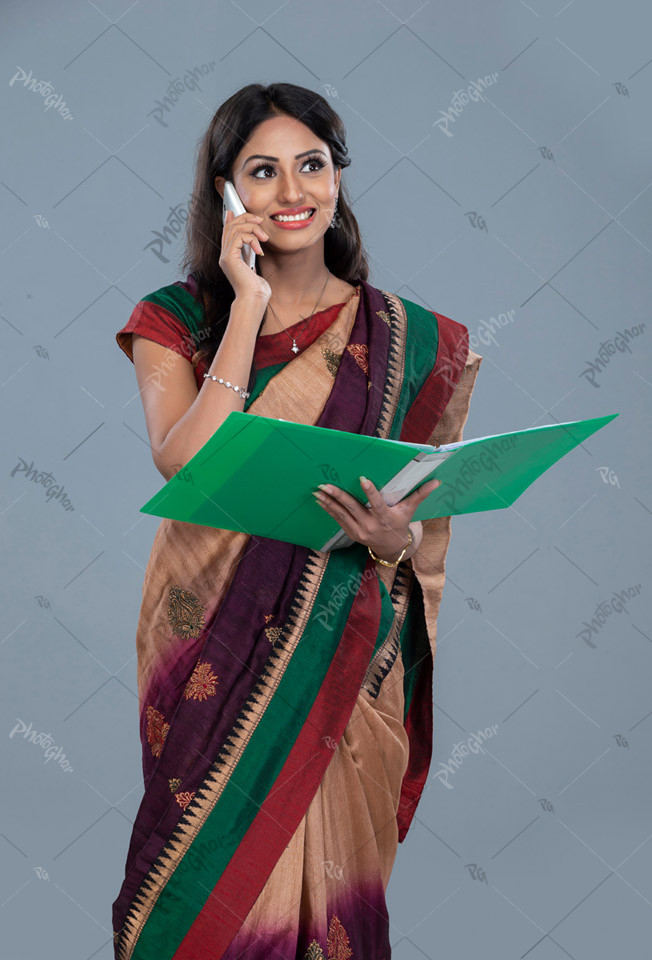 Female woman executive talking on a smartphone