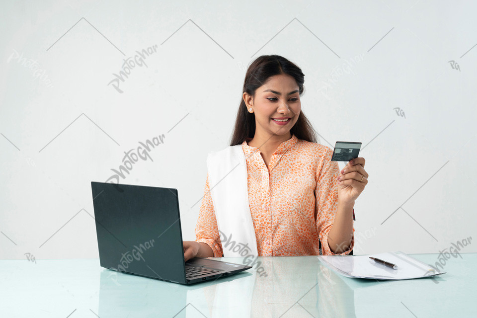 Female worker using laptop