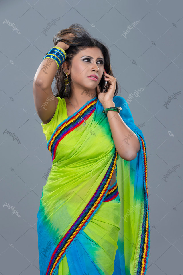 Frustrated young woman talking by phone