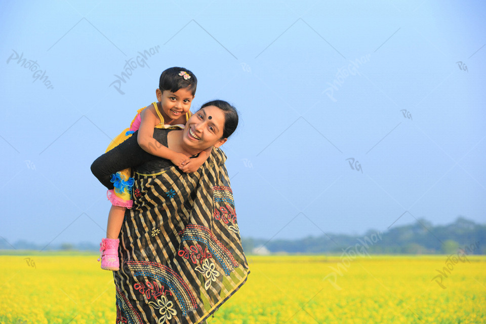 Happy Bangladeshi mother having fun with her daughter