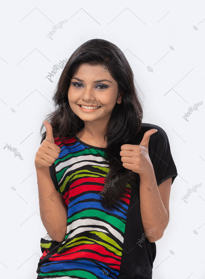 Happy Teenager girl giving thumbs up with both hand