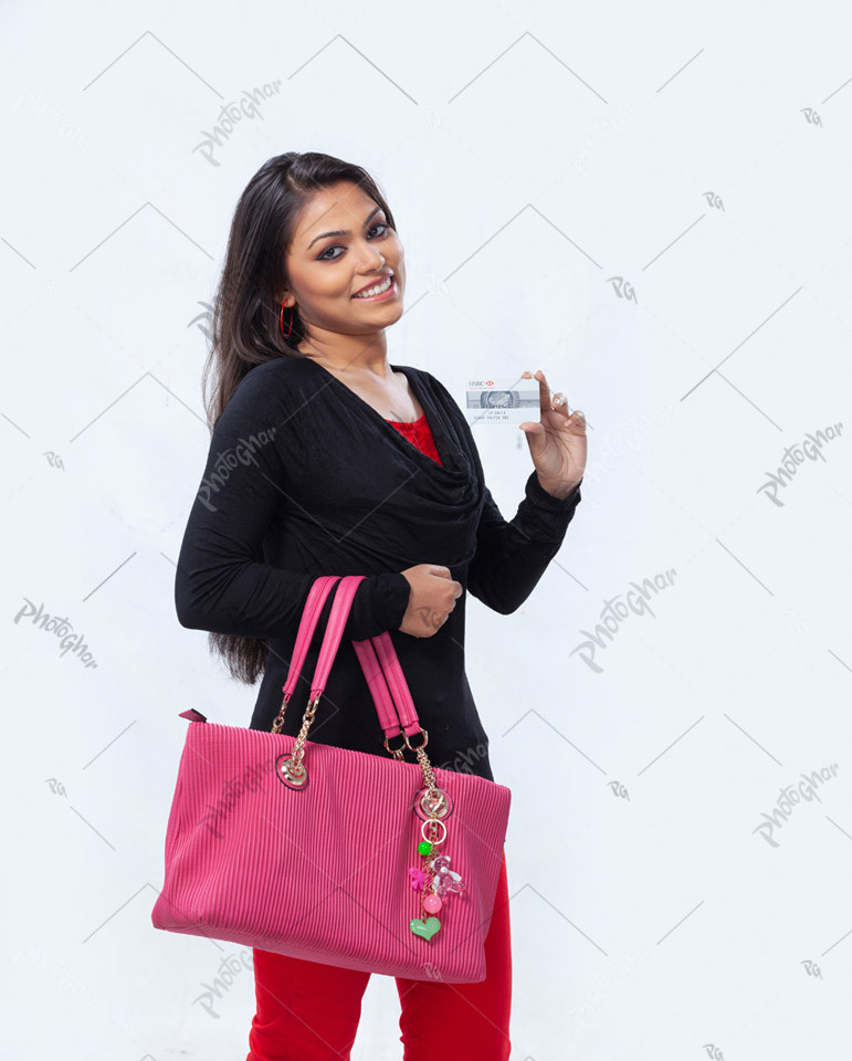 Happy Woman Showing Bank Card