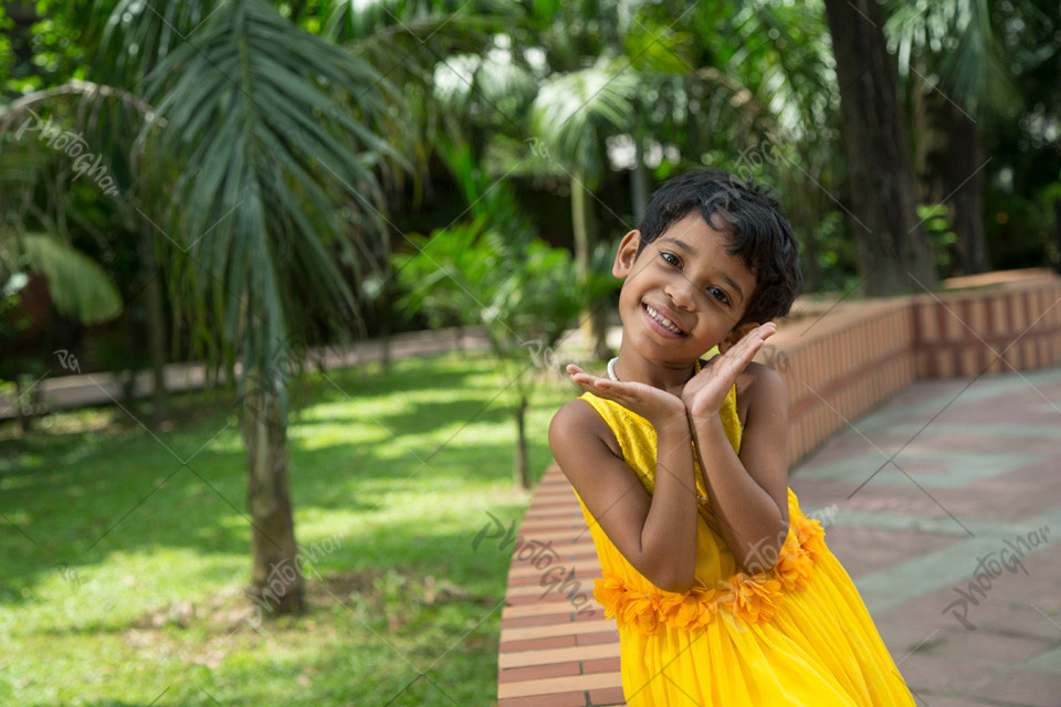 Happy child playing at city park