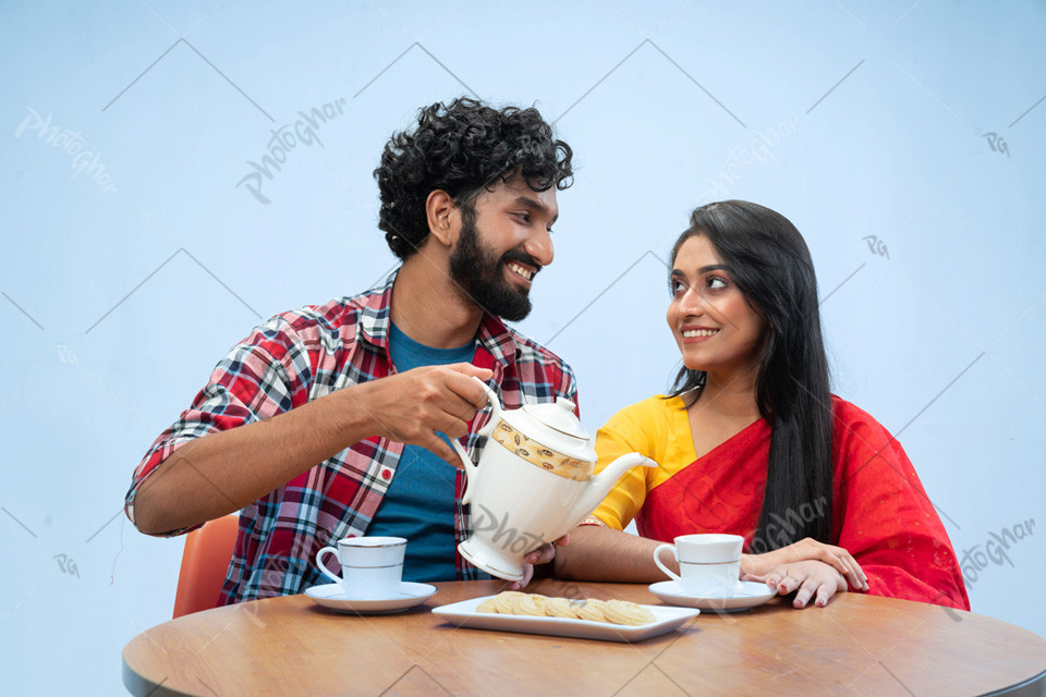 Happy couple having breakfast