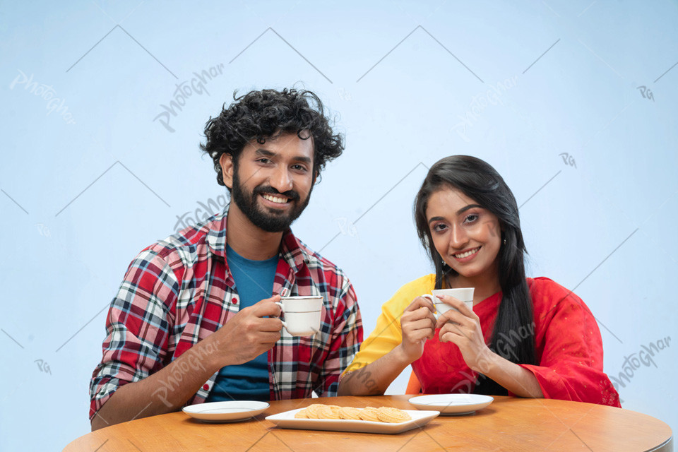 Happy couple husband wife enjoying breakfast