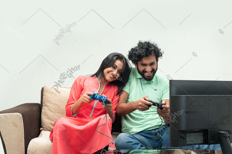 Happy friends playing video game